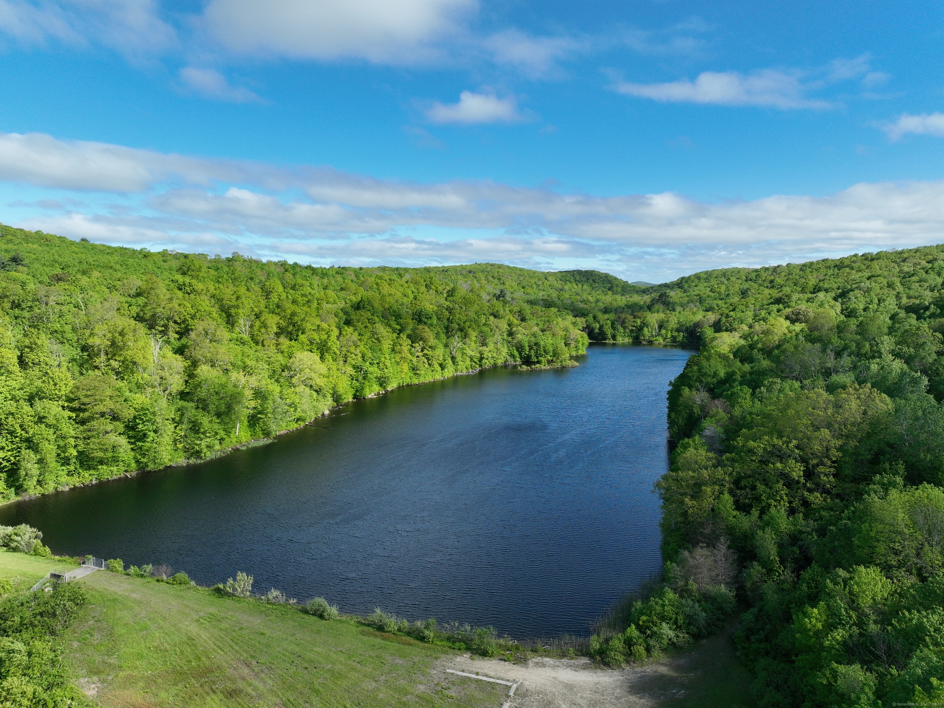 201 Diamond Ledge Road Stafford, CT 06076 - Photo 10 of 25 a view of a lake with a yard
