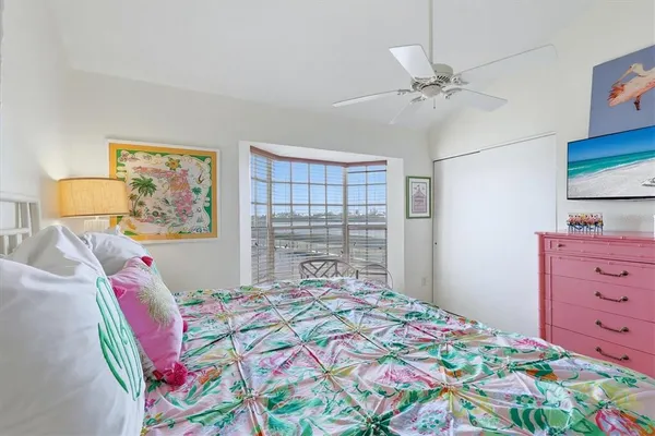 a bedroom with a bed and furniture