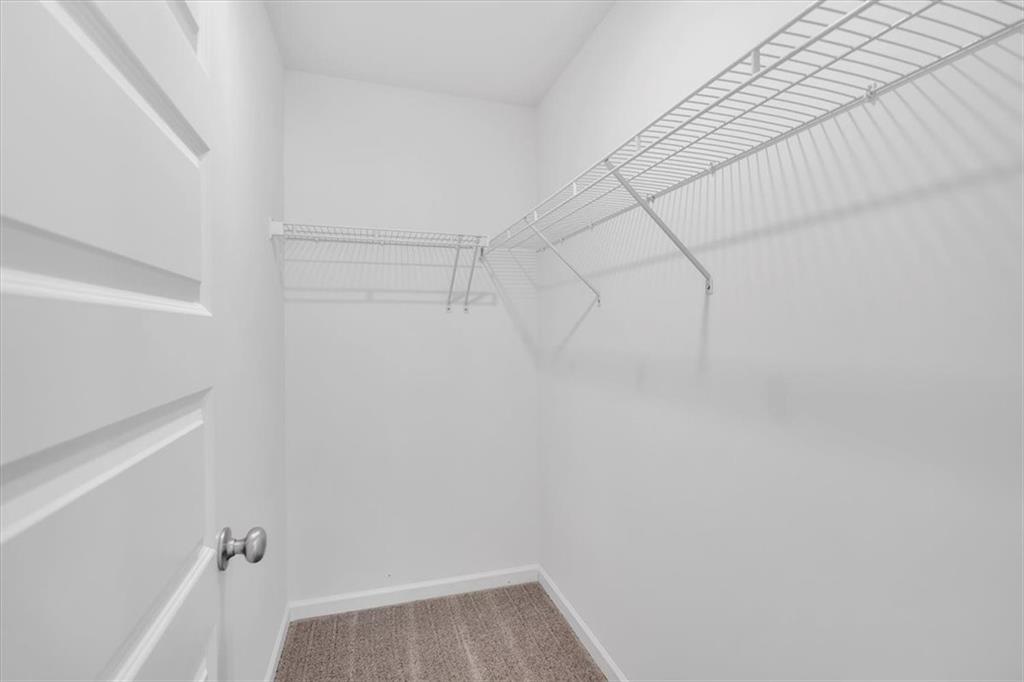 103 Lavender Circle Calhoun, GA 30701 - Photo 12 of 19 a view of a room with racks on the wall