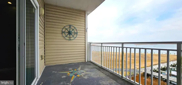 a view of a door and a window
