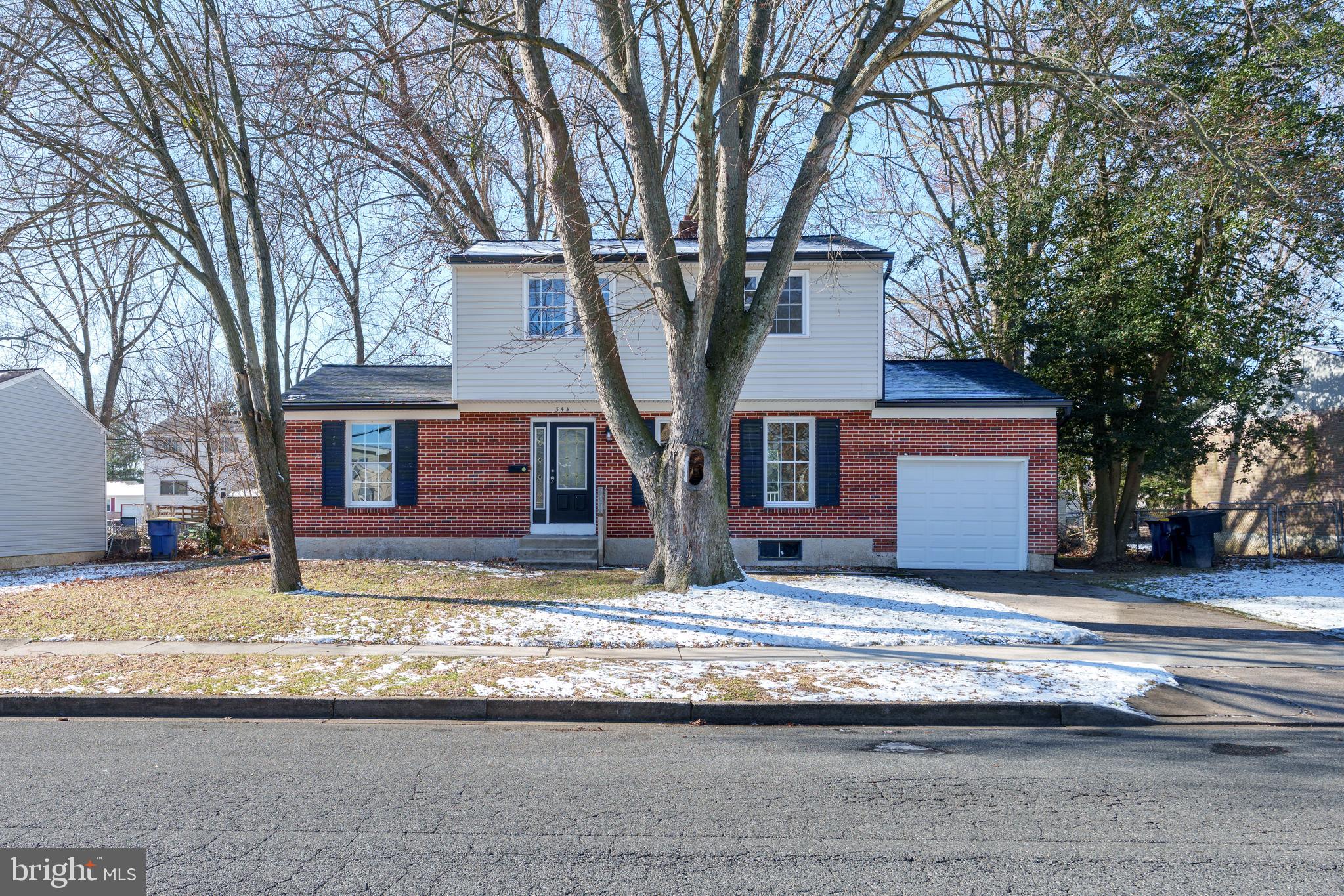 344 Nimitz Road Dover, DE 19901 - Photo 2 of 26 a house that has a tree in front of it