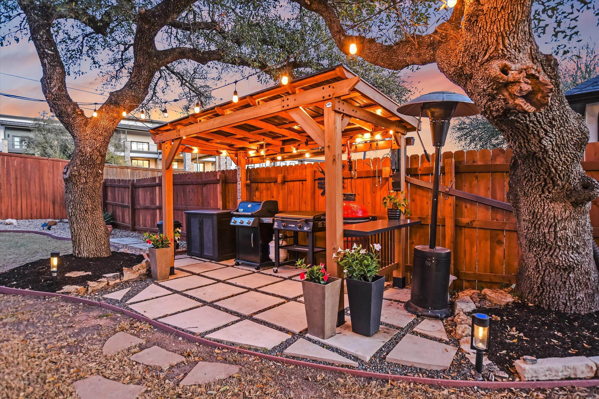332 Axis Loop Georgetown, TX 78628 - Photo 29 of 37 View of patio with grilling area and fence