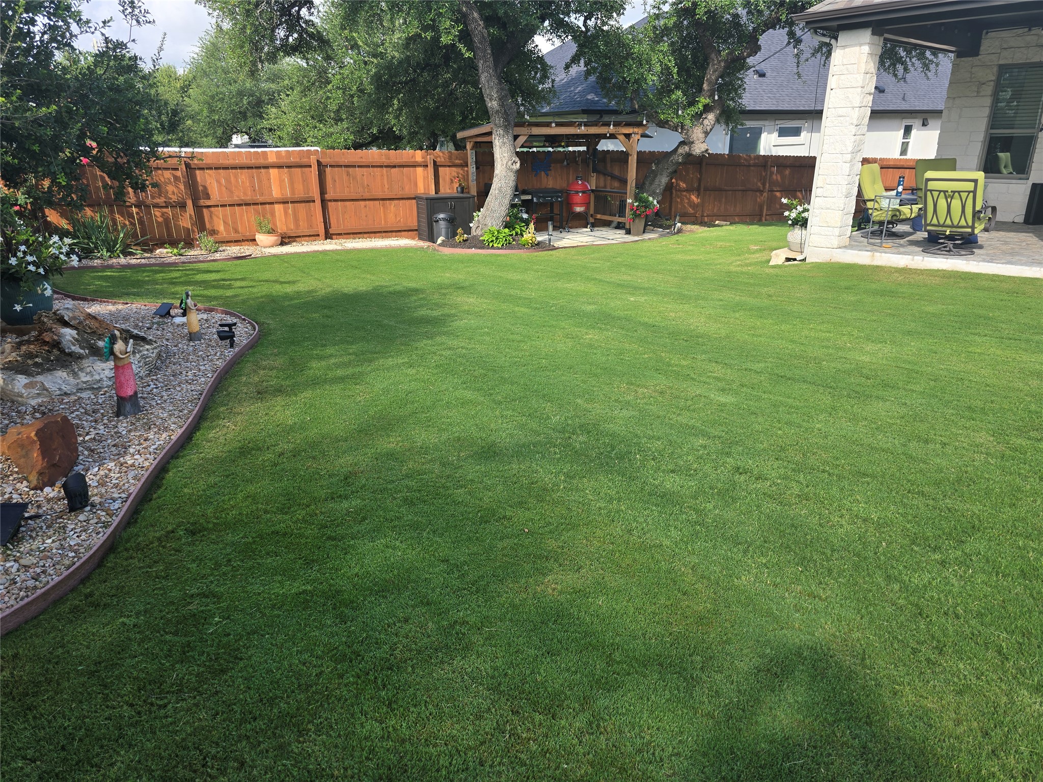 332 Axis Loop Georgetown, TX 78628 - Photo 33 of 37 Fenced backyard featuring a patio area and a gazebo