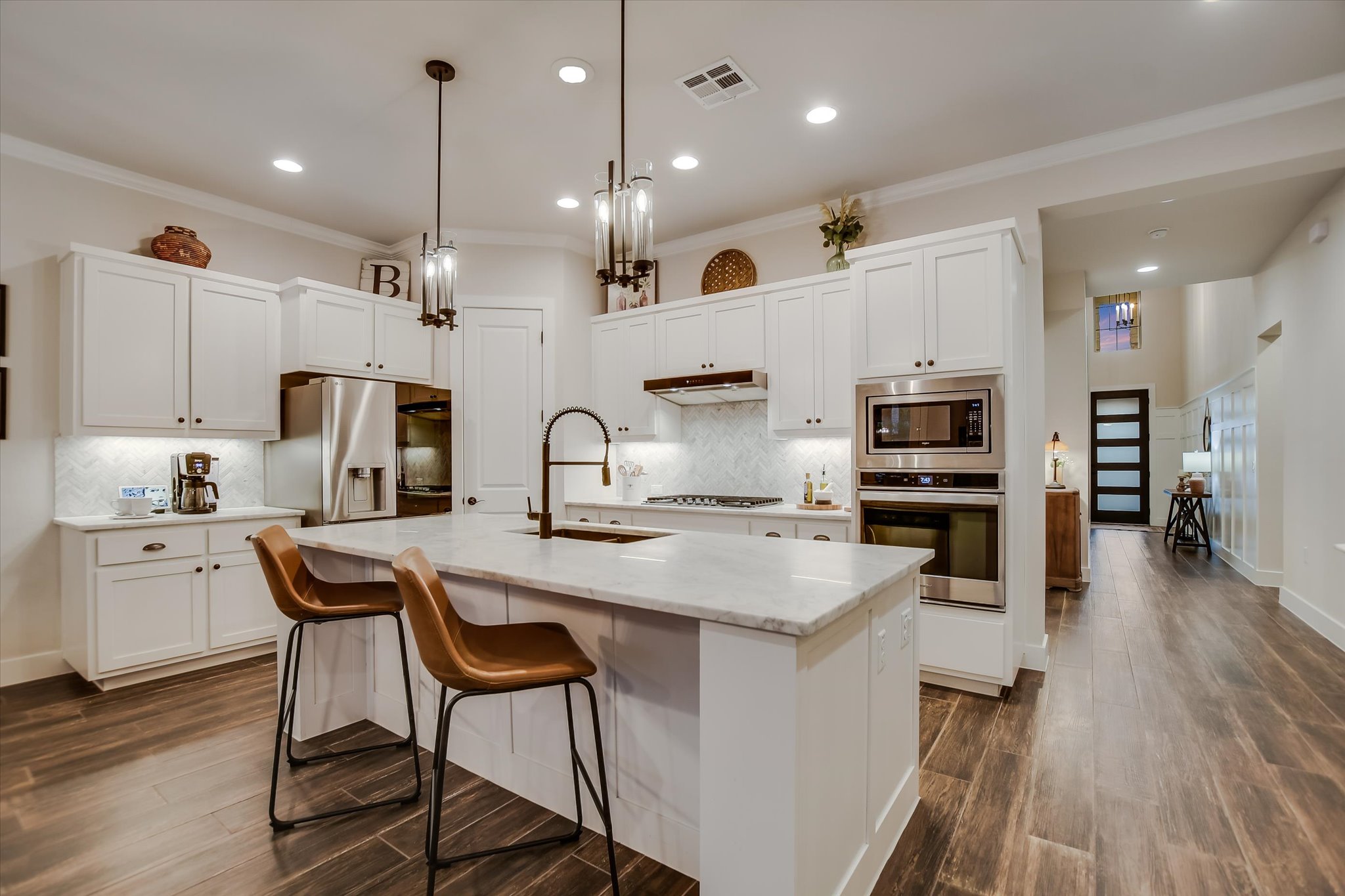332 Axis Loop Georgetown, TX 78628 - Photo 6 of 37 Kitchen featuring center island with eating space