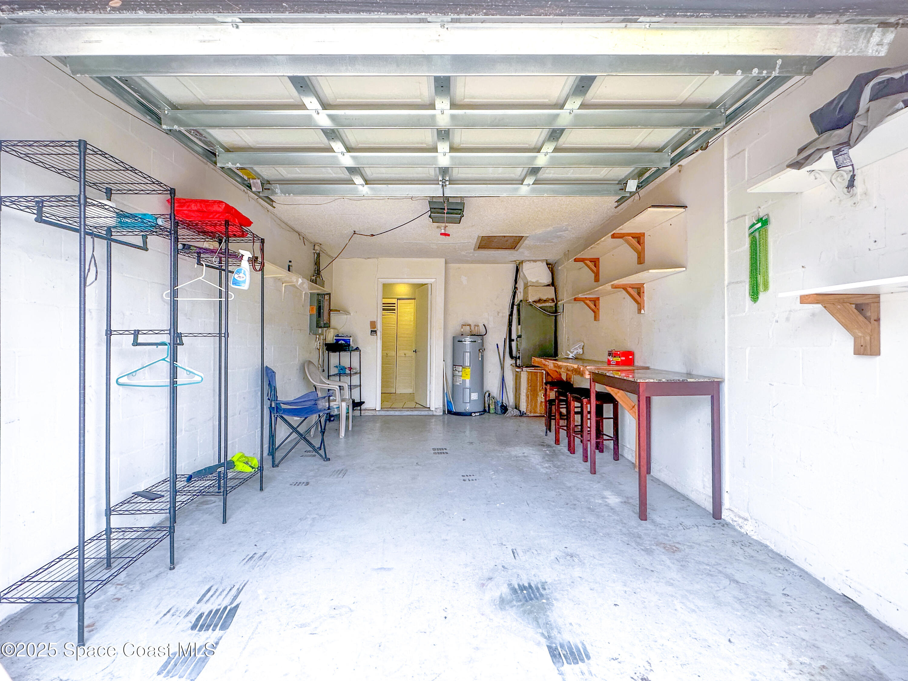 8215 Autumn Oak Avenue Port Richey, FL 34668 - Photo 19 of 21 a view of storage and utility room