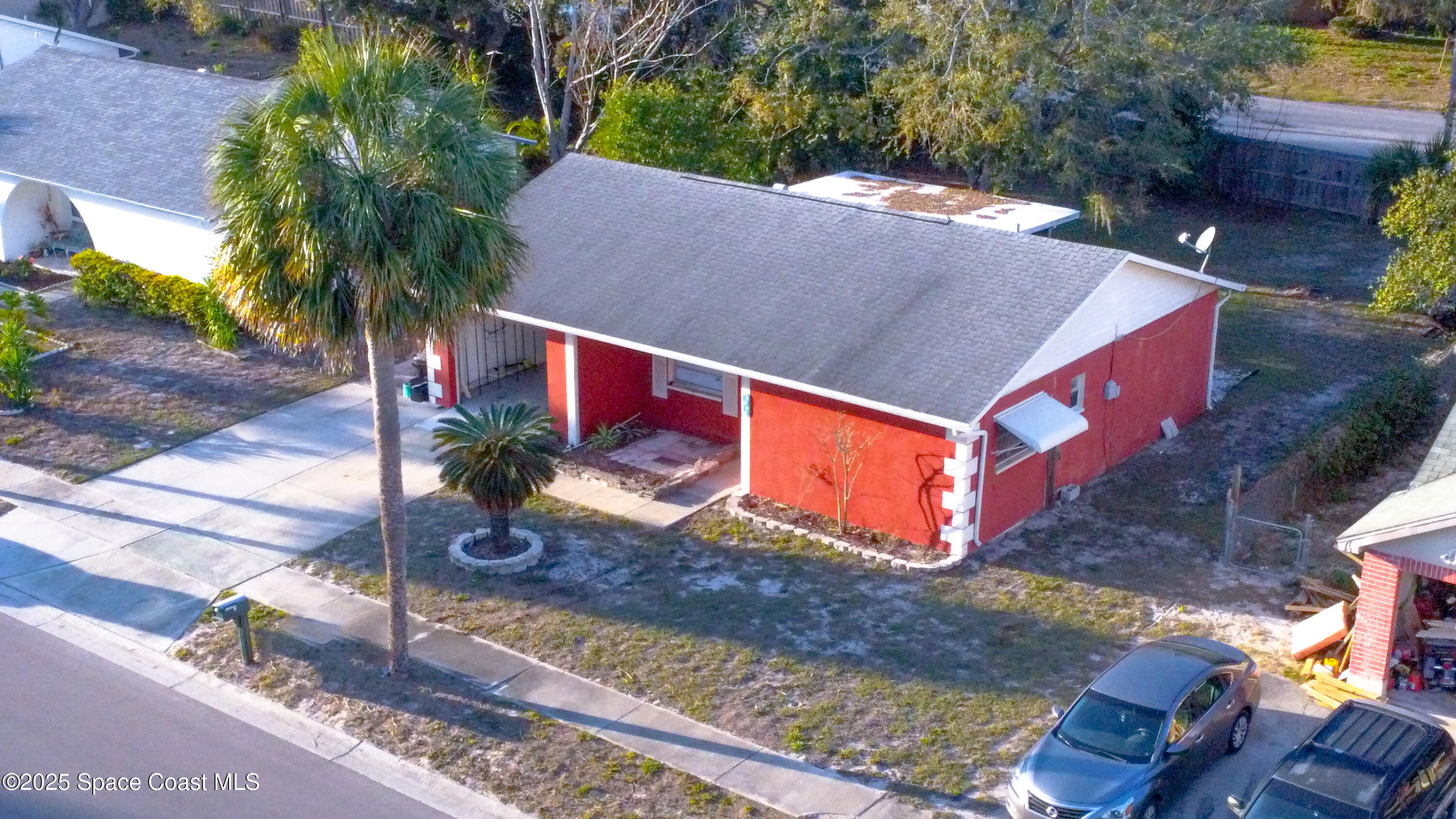 8215 Autumn Oak Avenue Port Richey, FL 34668 - Photo 2 of 21 a sign that is on the side of the road