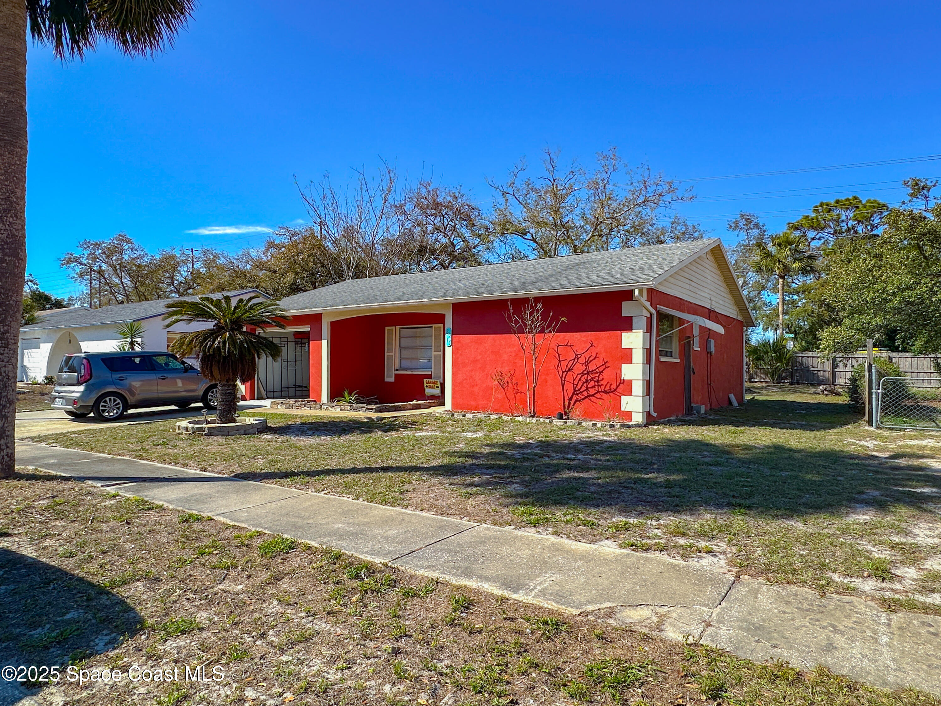 8215 Autumn Oak Avenue Port Richey, FL 34668 - Photo 4 of 21 a view of a house with a yard