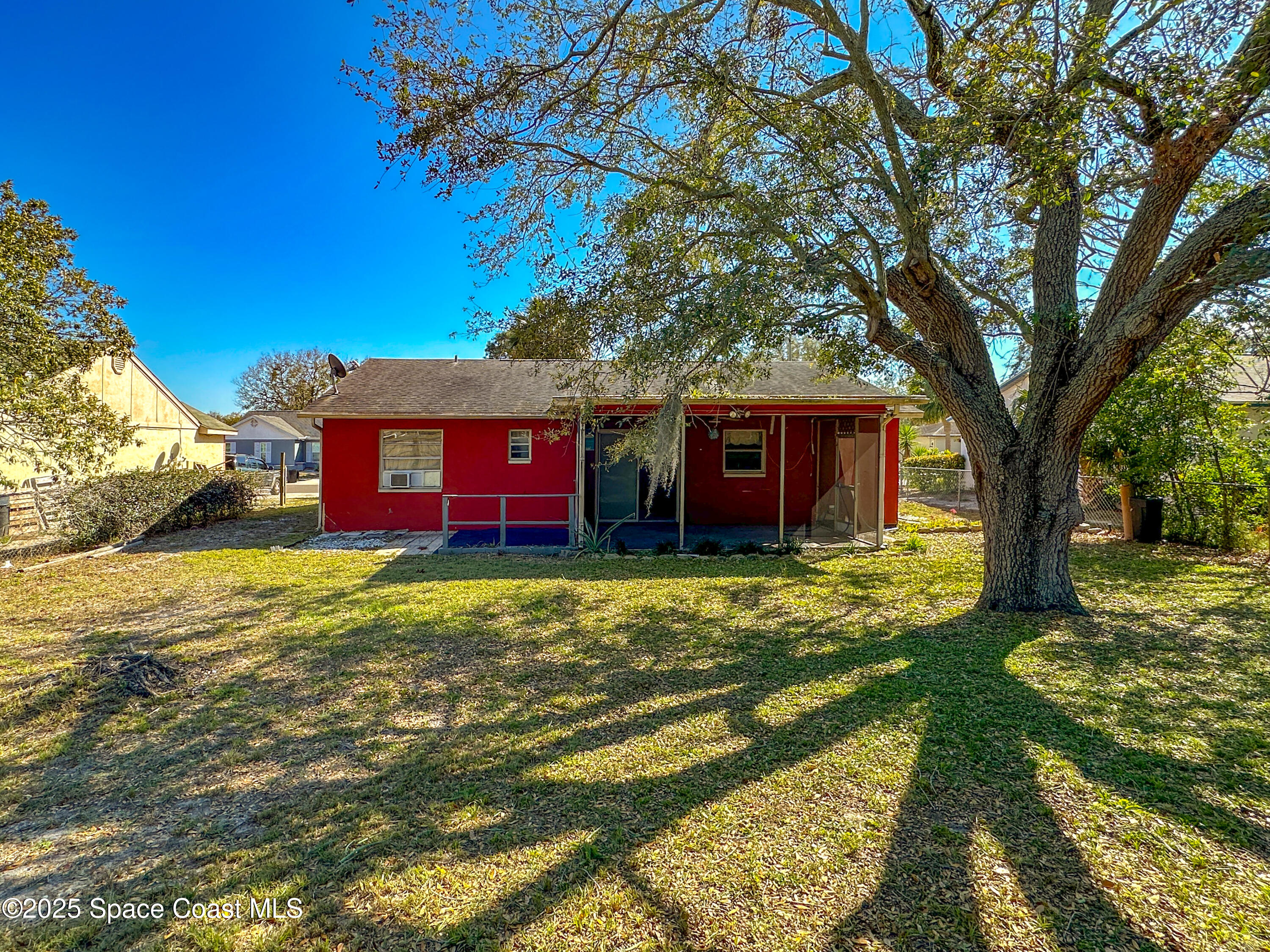 8215 Autumn Oak Avenue Port Richey, FL 34668 - Photo 8 of 21 a view of a house with a yard