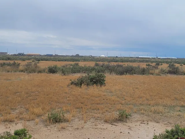 a view of lake with mountain in the background