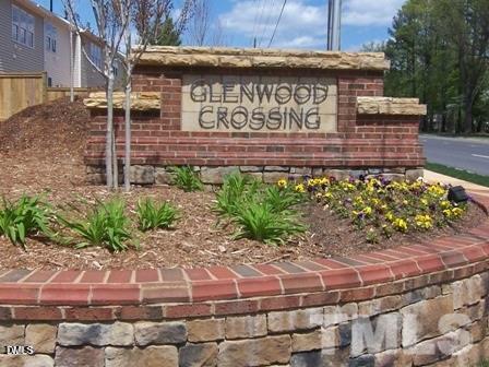 8323 Pilots View Drive Raleigh, NC 27617 - Photo 4 of 5 a sign on the side of a building