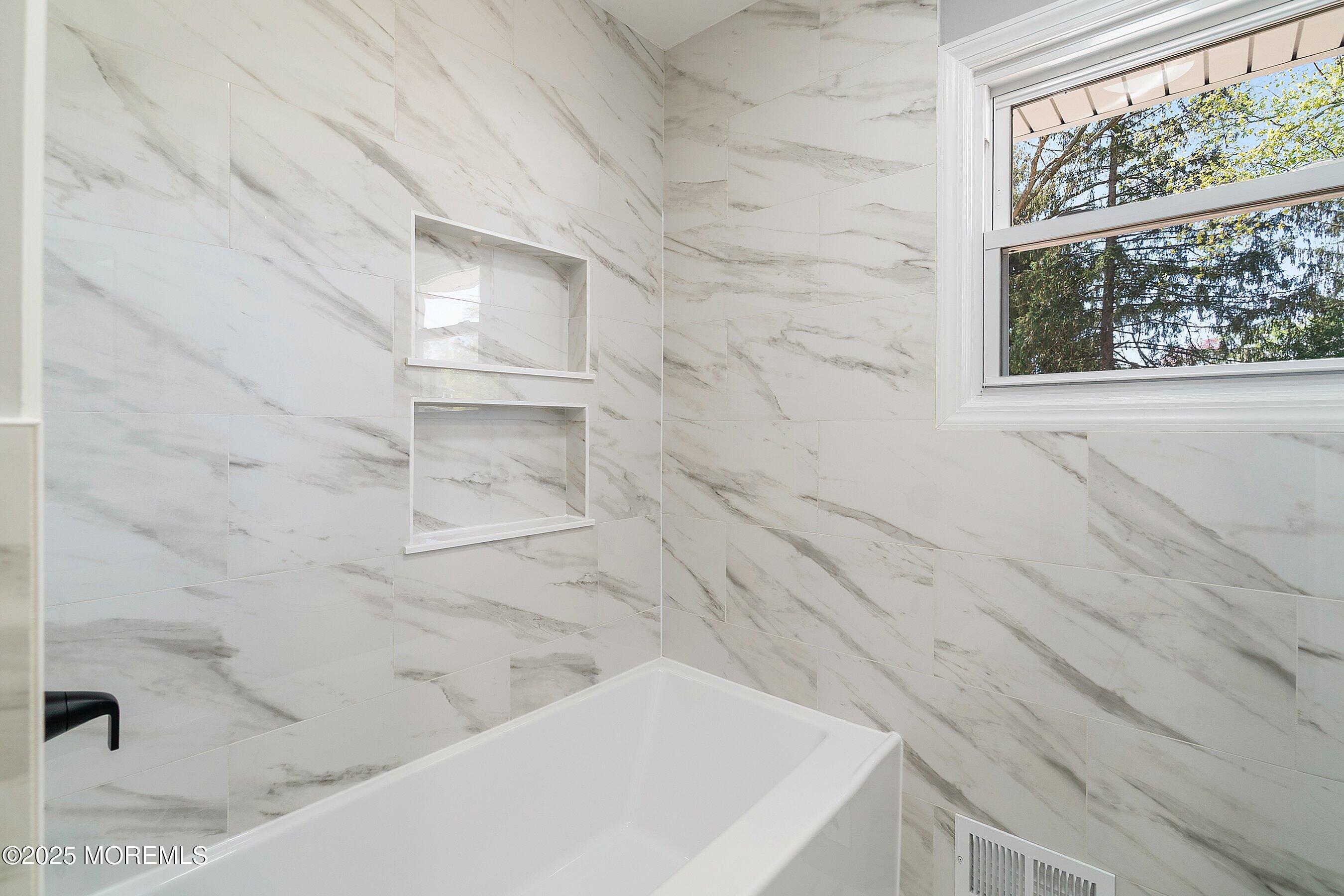 15 Springhill Drive Howell, NJ 07731 - Photo 19 of 32 a bathroom with a bathtub