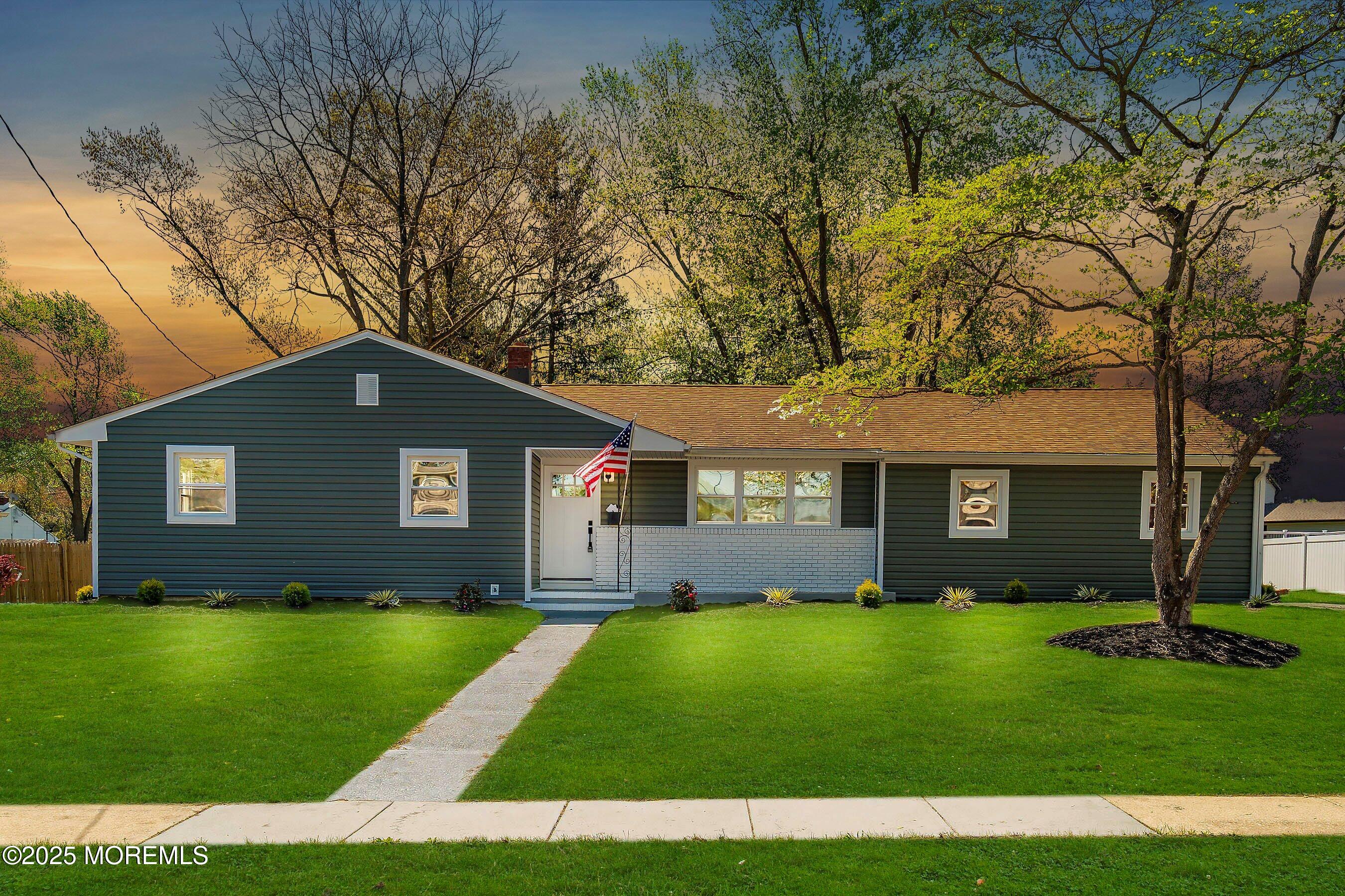 15 Springhill Drive Howell, NJ 07731 - Photo 2 of 32 a front view of house with yard and green space
