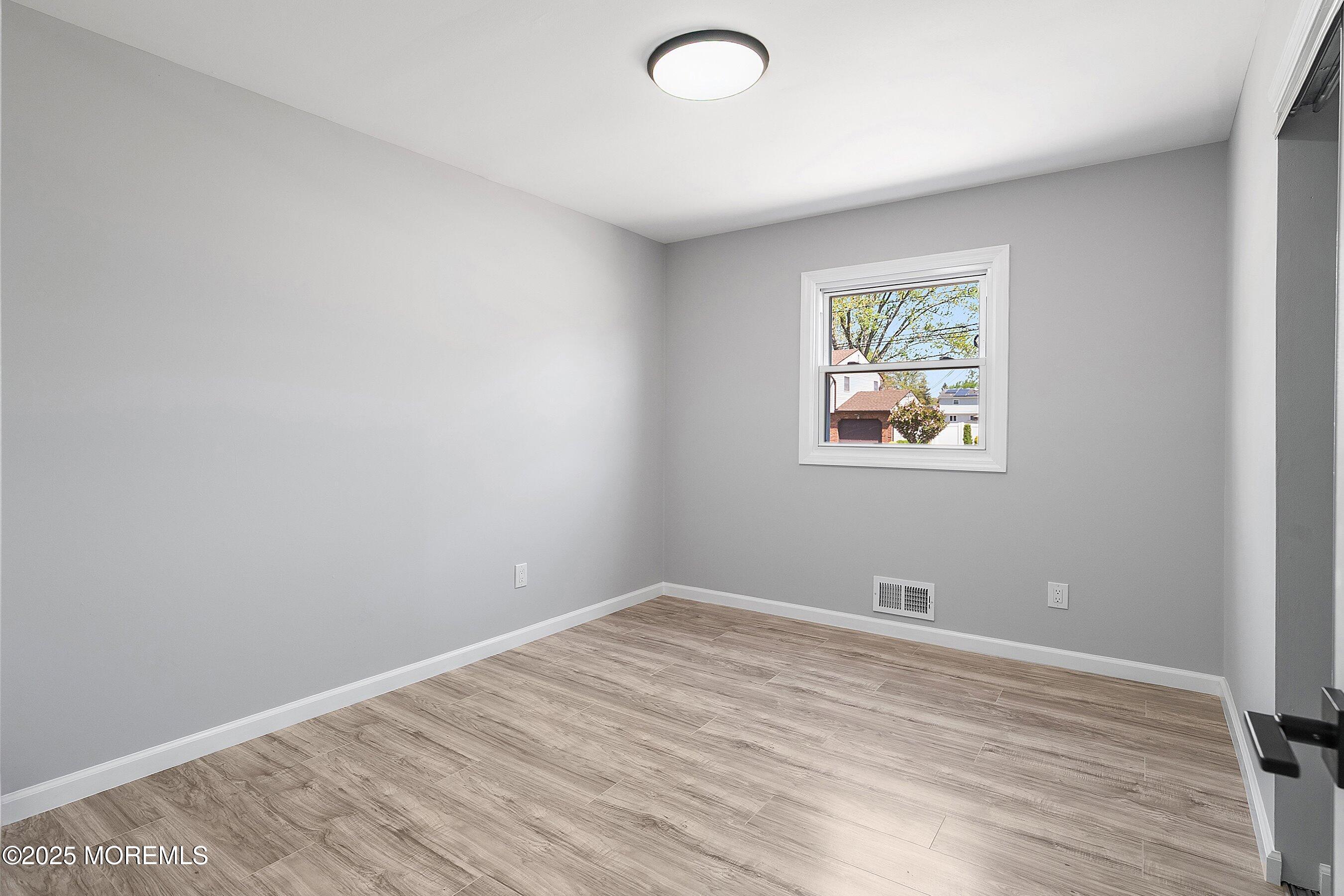 15 Springhill Drive Howell, NJ 07731 - Photo 21 of 32 wooden floor in a room