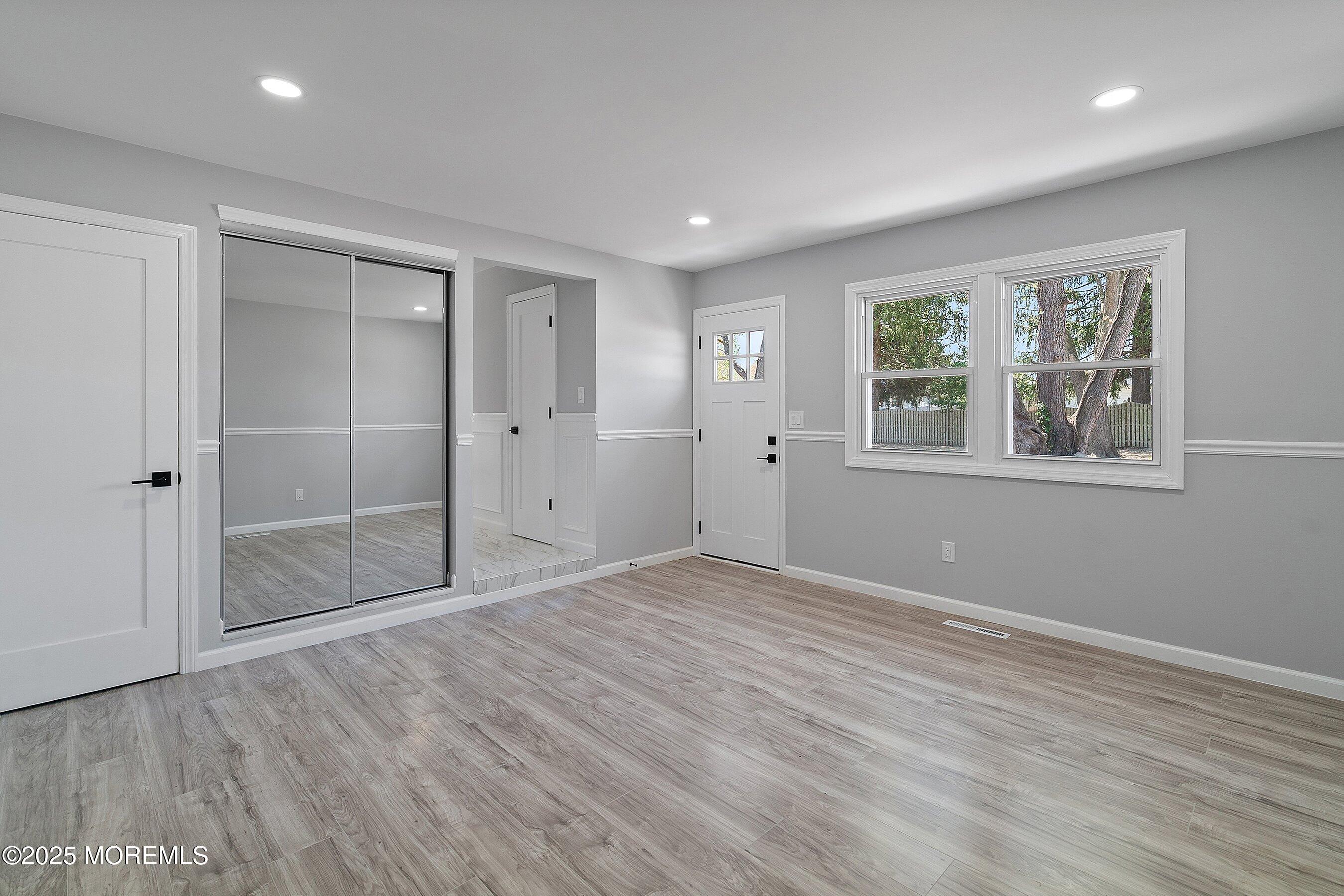 15 Springhill Drive Howell, NJ 07731 - Photo 23 of 32 an empty room with windows and closet