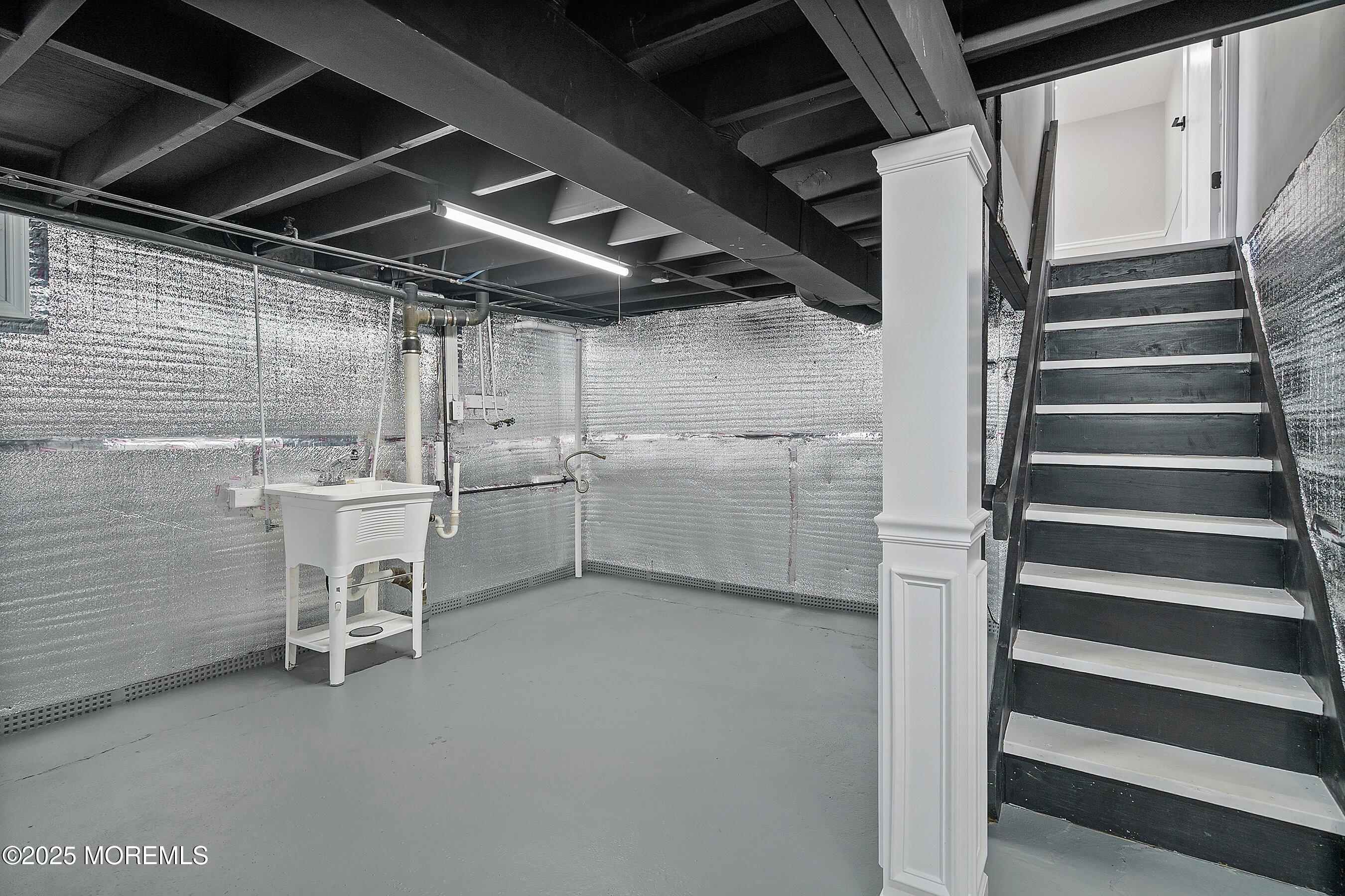 15 Springhill Drive Howell, NJ 07731 - Photo 25 of 32 a utility room with multiple dryer and washer