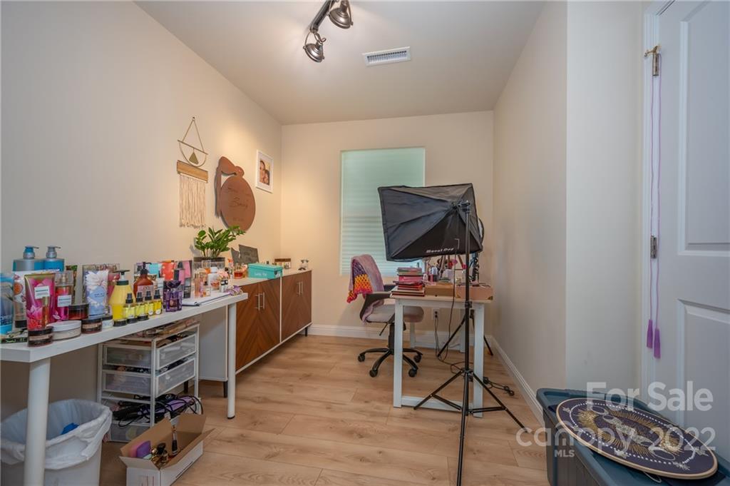 111 Jervey Road Tryon, NC 28782 - Photo 19 of 34 a room with furniture and wooden floor