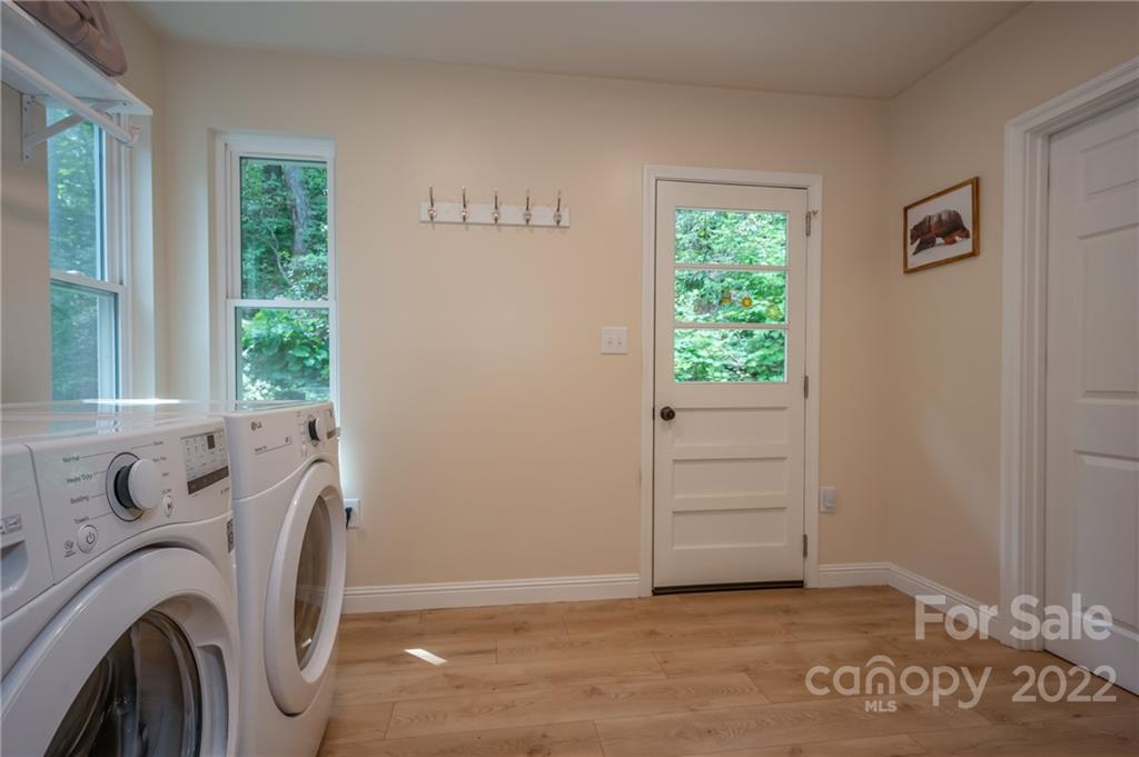 111 Jervey Road Tryon, NC 28782 - Photo 23 of 34 a view of livingroom with washer and dryer