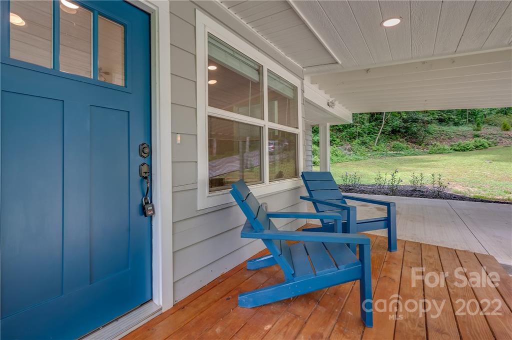 111 Jervey Road Tryon, NC 28782 - Photo 28 of 34 a view of a two chairs in the patio