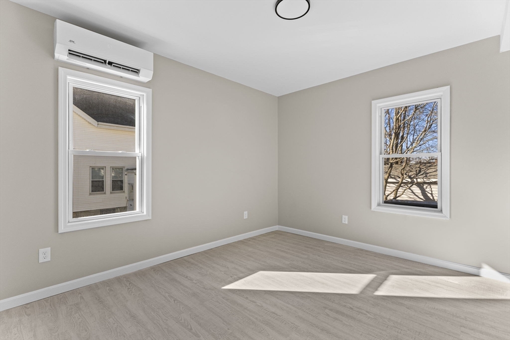 45 Garfield Street Fall River, MA 02721 - Photo 15 of 38 a view of an empty room with a window