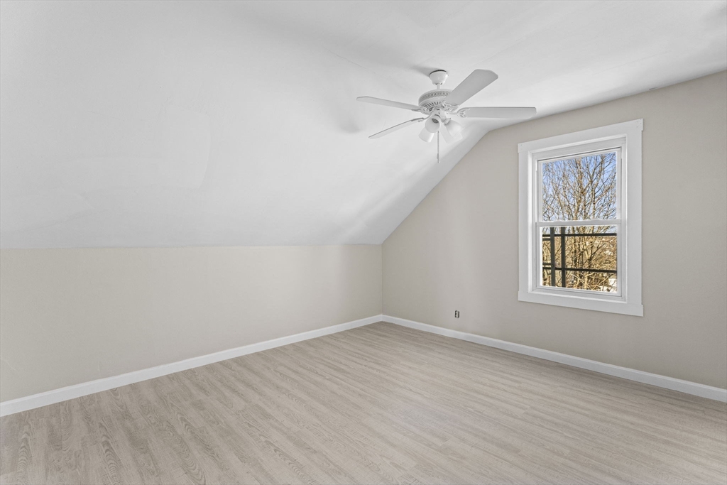 45 Garfield Street Fall River, MA 02721 - Photo 30 of 38 wooden floor in an empty room with a window