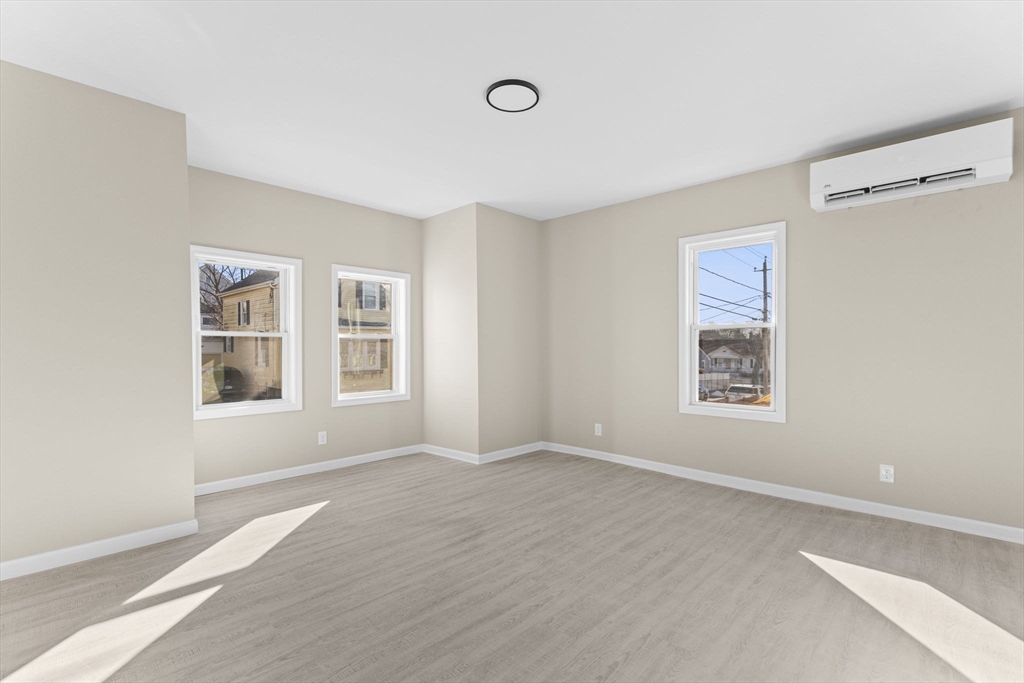 45 Garfield Street Fall River, MA 02721 - Photo 10 of 38 a view of an empty room with a window