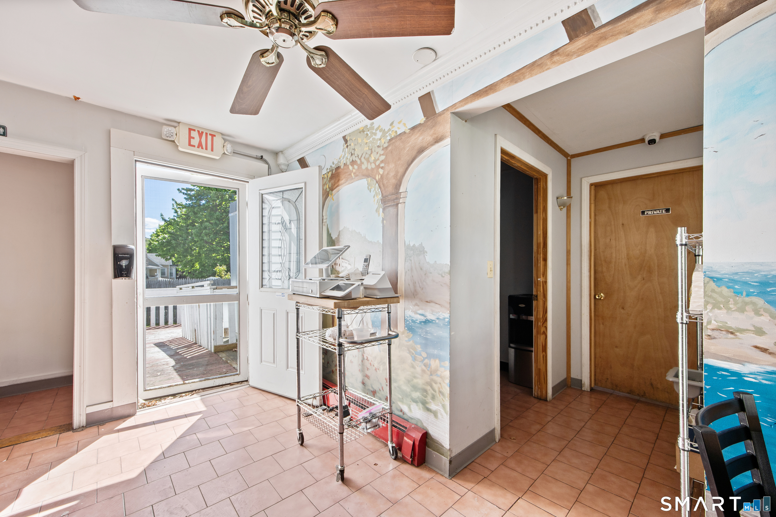 277 South Main Street Torrington, CT 06790 - Photo 7 of 26 a dining room with furniture and a chandelier fan