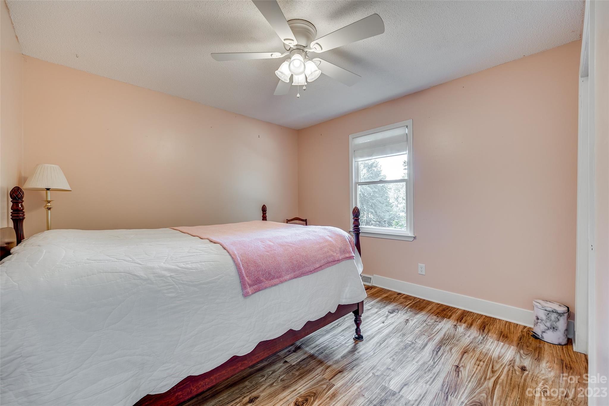 16064 Taku Court Tega Cay, SC 29708 - Photo 22 of 31 a bedroom with a bed and a window