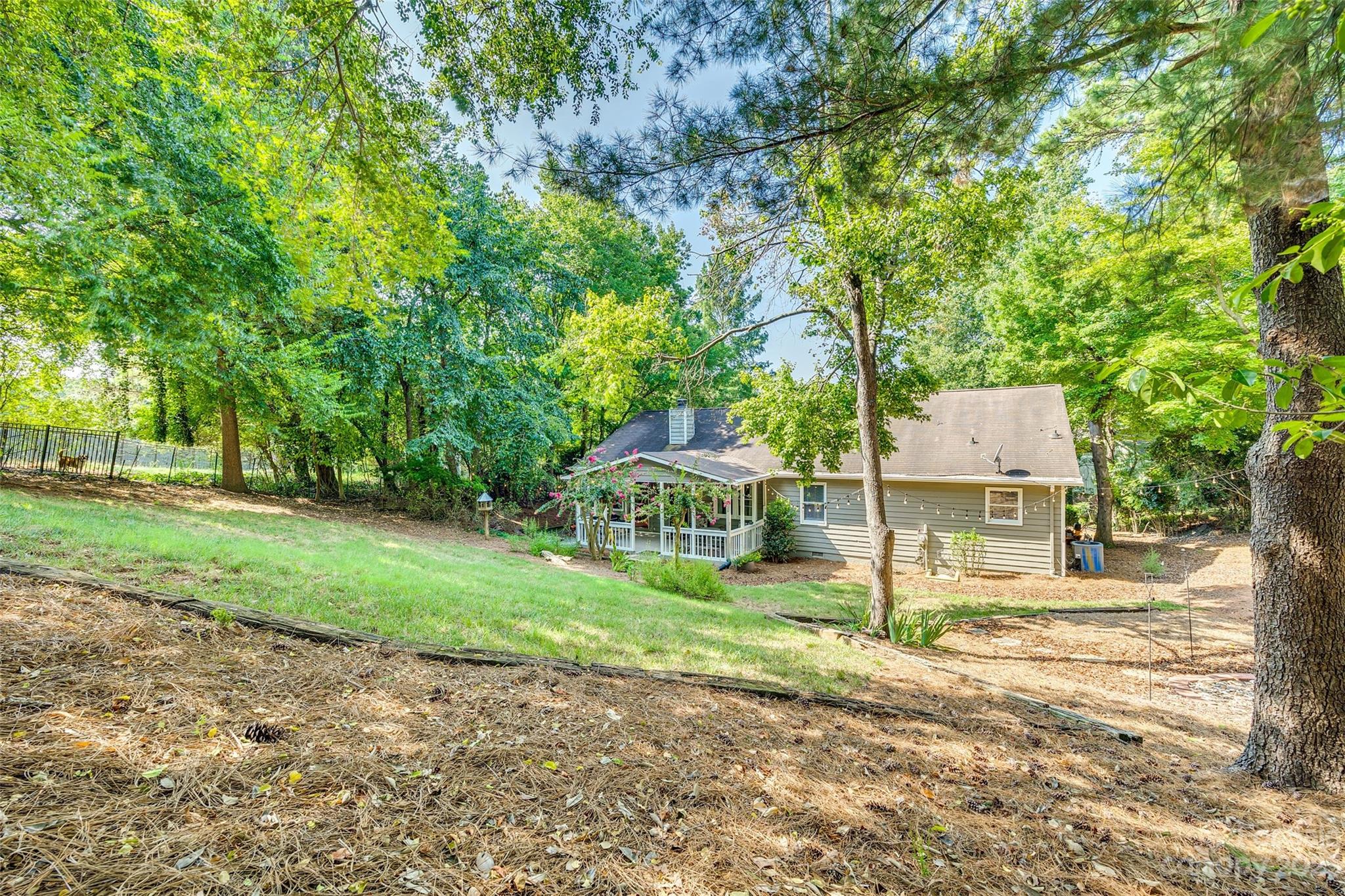 16064 Taku Court Tega Cay, SC 29708 - Photo 29 of 31 a front view of a house with garden