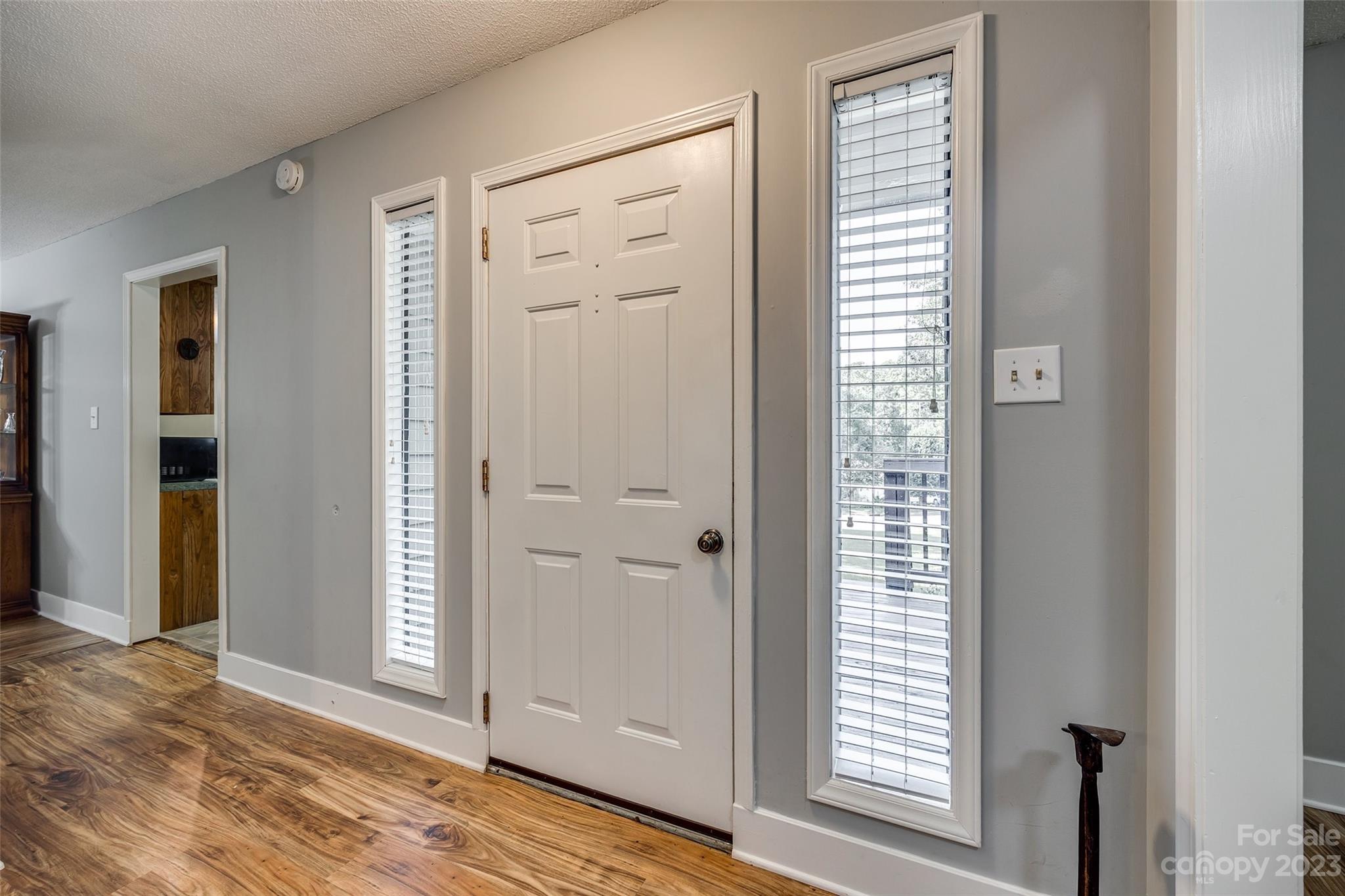 16064 Taku Court Tega Cay, SC 29708 - Photo 3 of 31 an empty room with windows and closet