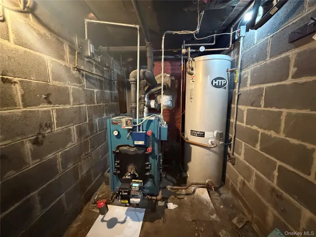 a bathroom with a sink mirror toilet and shower