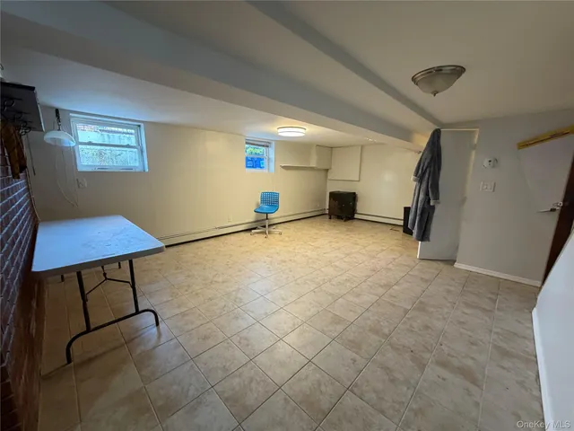 a utility room with sink dryer and washer
