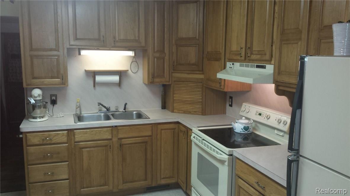 14058 Foley Road Capac, MI 48014 - Photo 2 of 20 This is a view of the kitchen.
