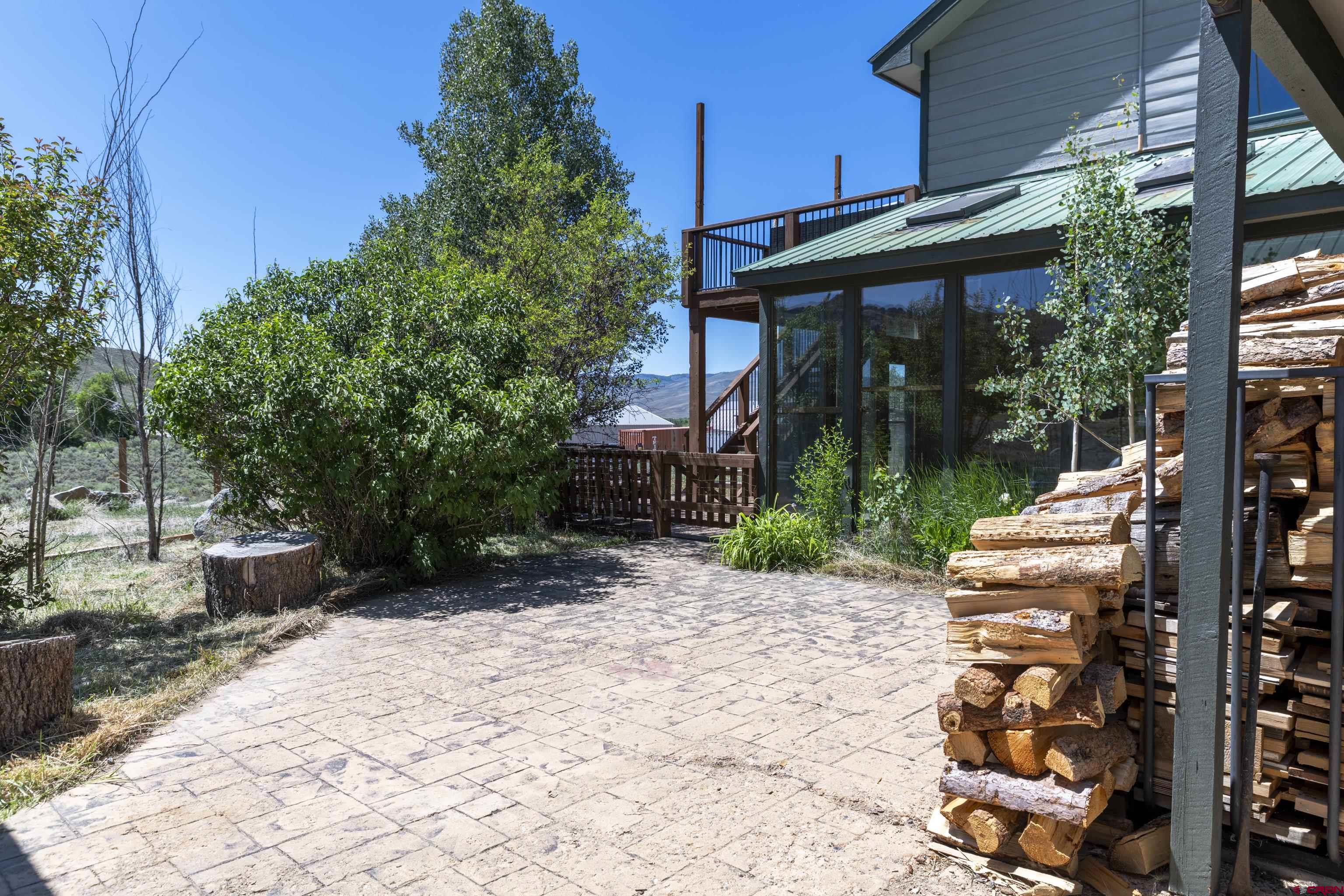 388 Columbine Road Gunnison, CO 81230 - Photo 33 of 45 a front view of a house with garden