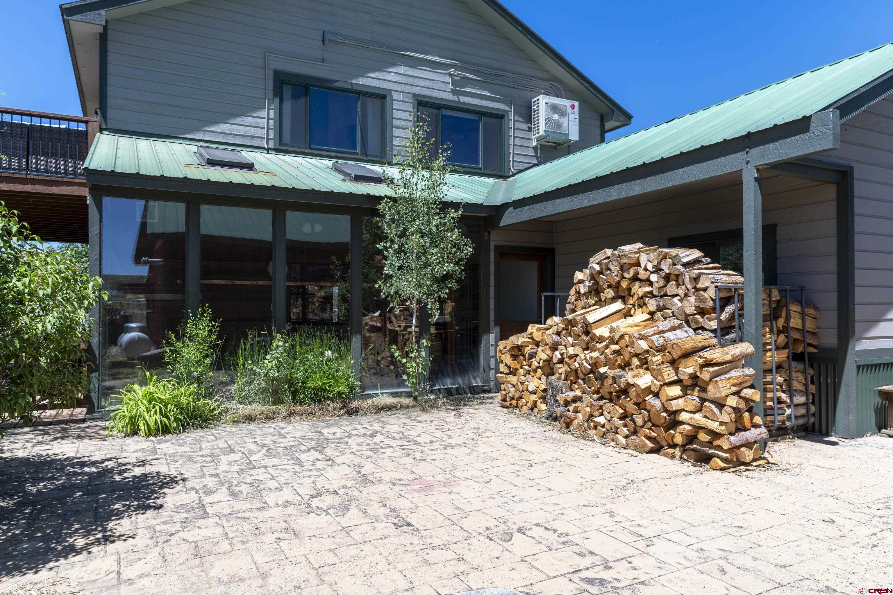 388 Columbine Road Gunnison, CO 81230 - Photo 34 of 45 a front view of a house with garden