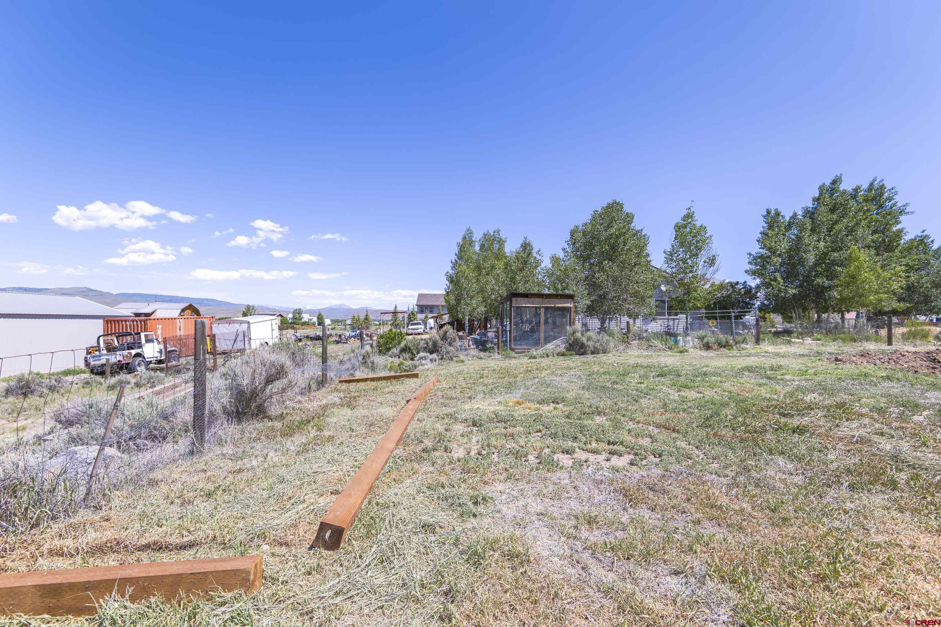 388 Columbine Road Gunnison, CO 81230 - Photo 39 of 45 a view of a dry yard with trees