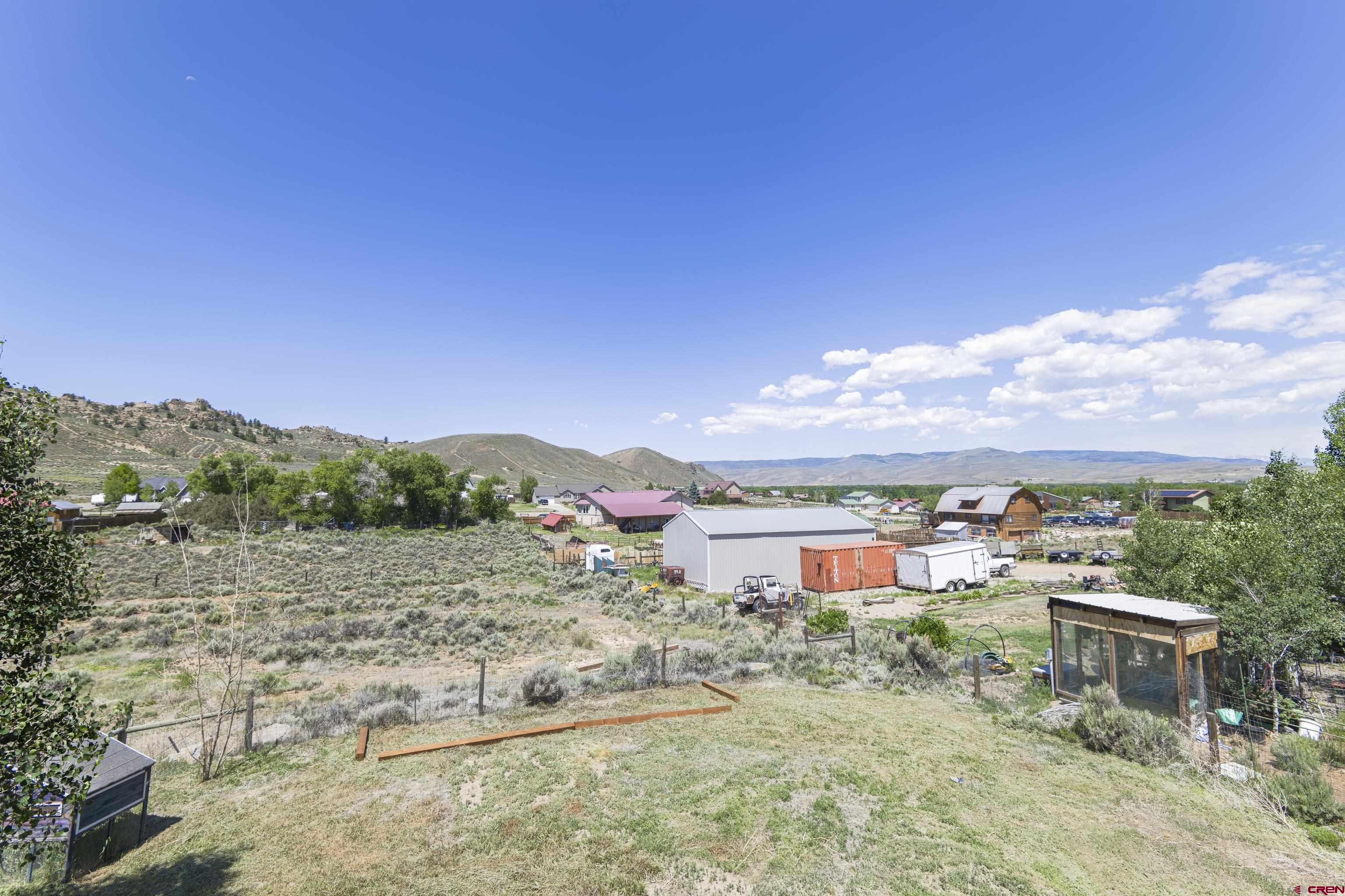 388 Columbine Road Gunnison, CO 81230 - Photo 40 of 45 a view of a lake with a mountain