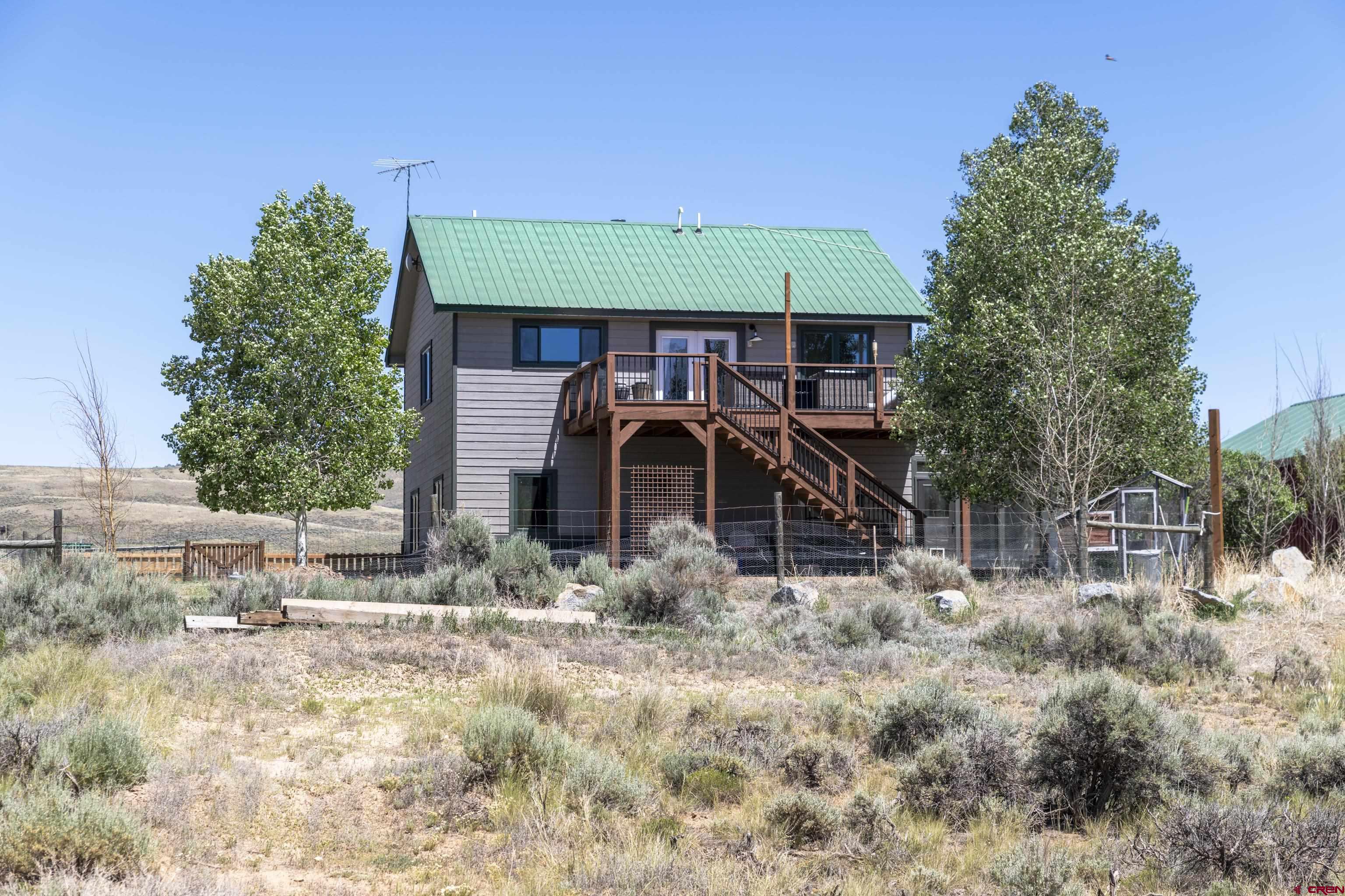 388 Columbine Road Gunnison, CO 81230 - Photo 45 of 45 a house view with a outdoor space