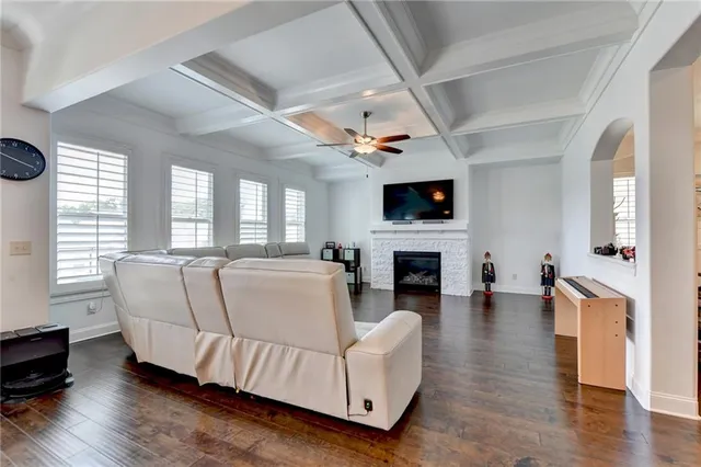 a bathroom with a granite countertop bathtub sink and shower