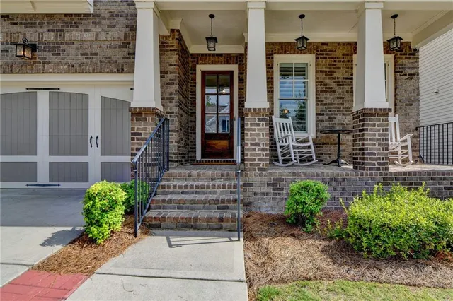 a view of entryway with wooden floor