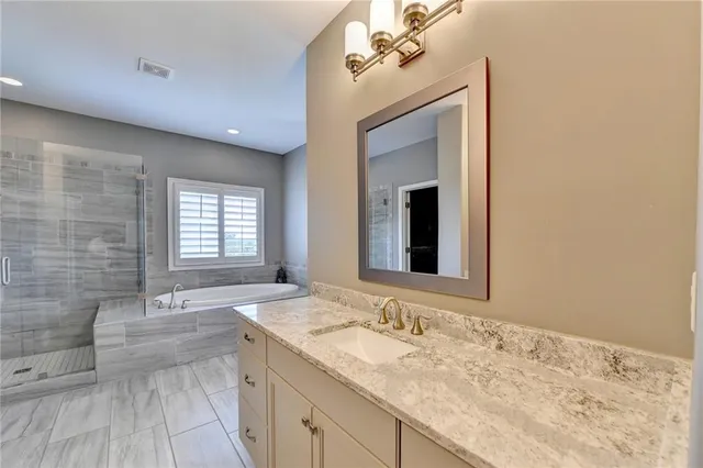 a living room with fireplace furniture and a wooden floor