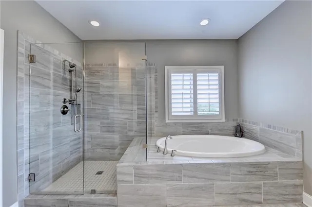 a living room with furniture fireplace and window