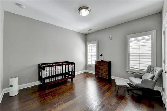 a view of balcony with wooden floor