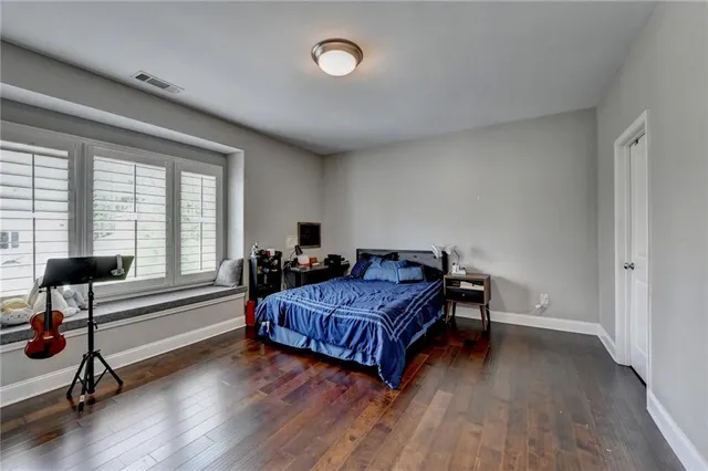 an aerial view of a house with an outdoor space