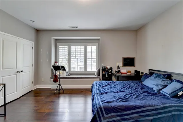 an aerial view of a house with a swimming pool outdoor seating and yard