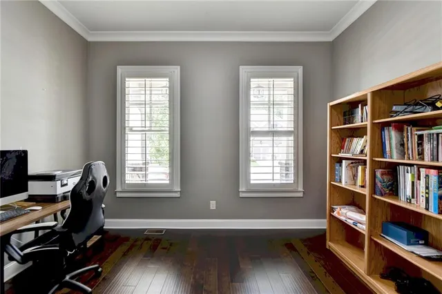 a workspace with furniture and a window