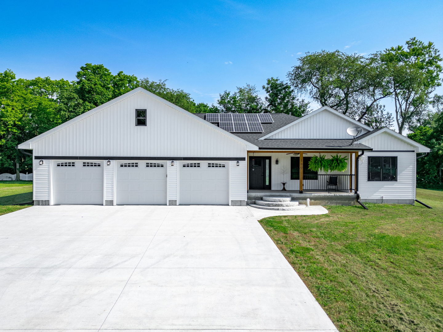 102 Sunset Lane Prophetstown, IL 61277 - Photo 2 of 41 a front view of a house with swimming pool having outdoor seating