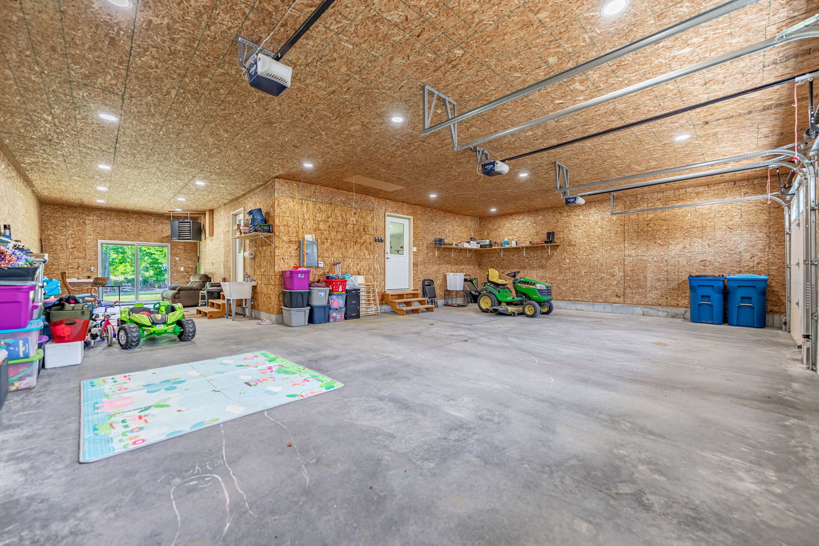 102 Sunset Lane Prophetstown, IL 61277 - Photo 28 of 41 a very nice looking room with a large window and potted plants