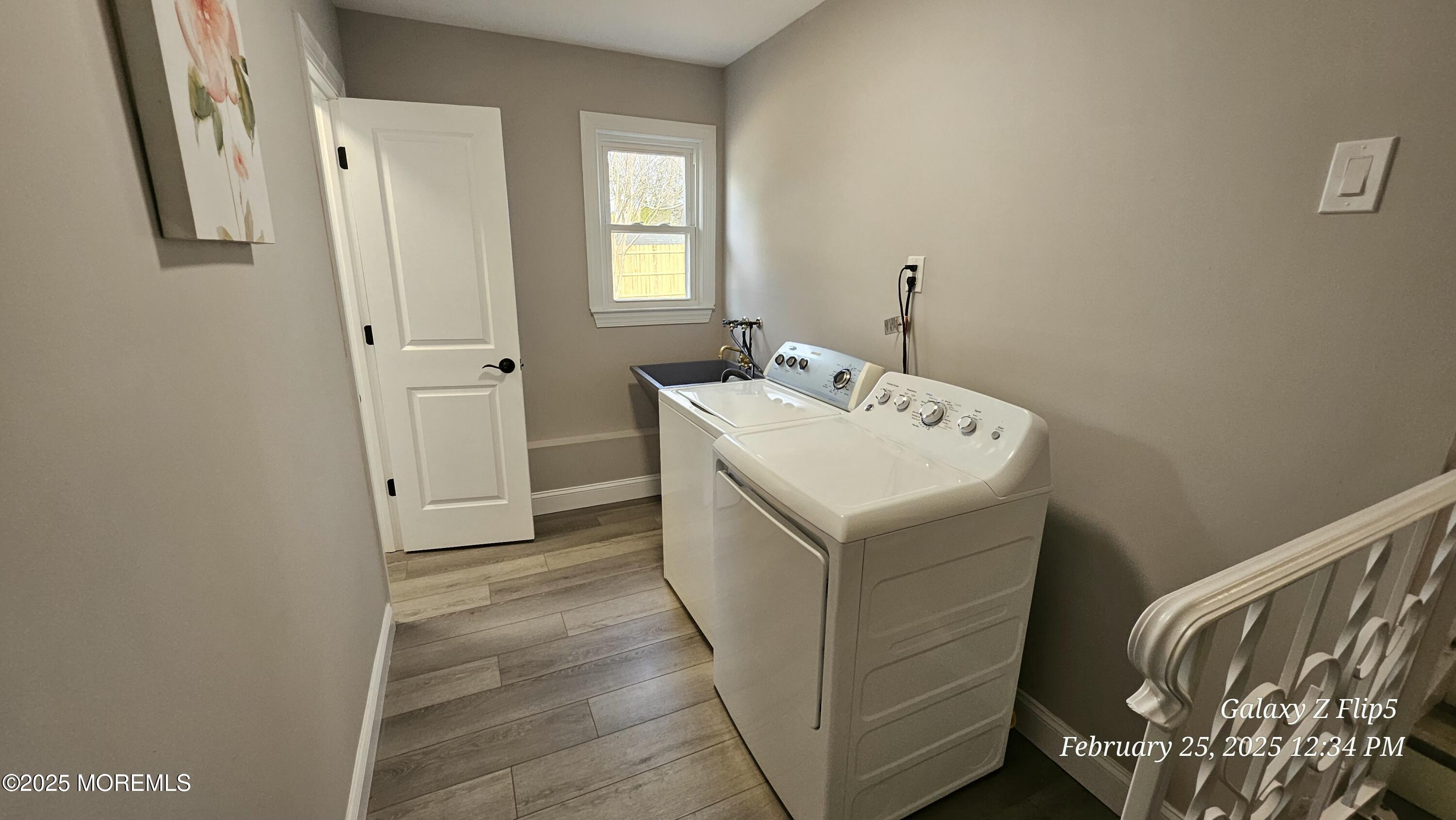 Park Avenue Freehold, NJ 07728 - Photo 12 of 18 a utility room with dryer and washer