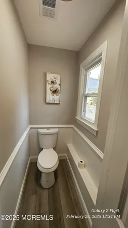 a view of a room with rack on the wall