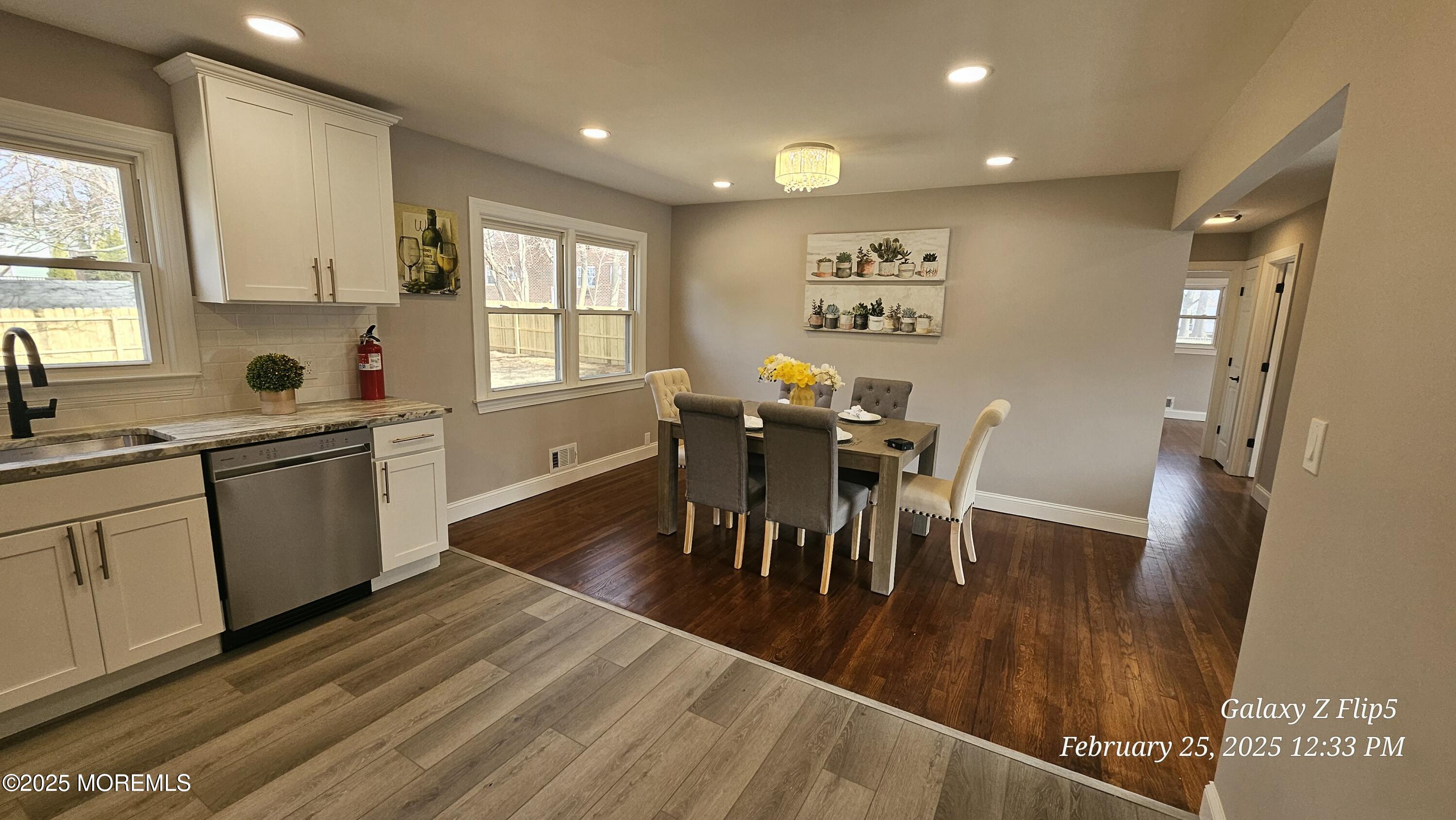 Park Avenue Freehold, NJ 07728 - Photo 3 of 18 a view of a dining room with furniture and wooden floor